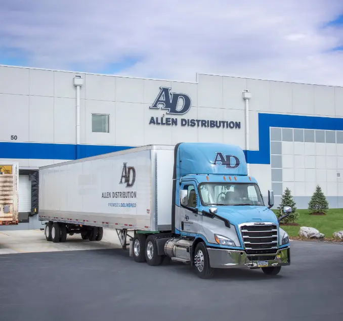 truck pulling away from warehouse loading zone